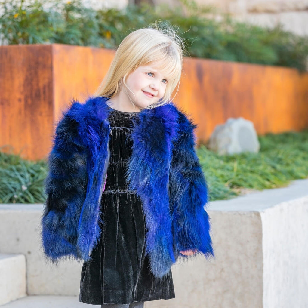 Toddler wearing C&B Furs cobalt blue fox fur bolero